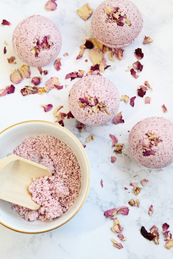This rose garden DIY bath bomb recipe uses beet powder for natural pink color with a combination of dried rose petals. 